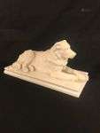 A porcelain desk piece in the shape of a retriever, marked K...