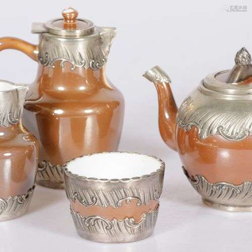 A set of (4) porcelain items with silver-plated fittings, Fr...