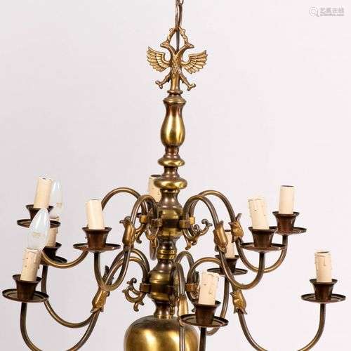 A ten light brass chandelier with double-headed eagle, 20th ...