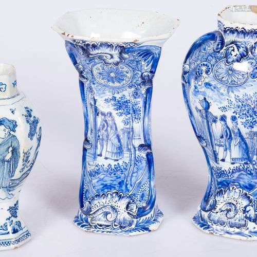 A lot comprised of (3) Delftware vases with European style m...