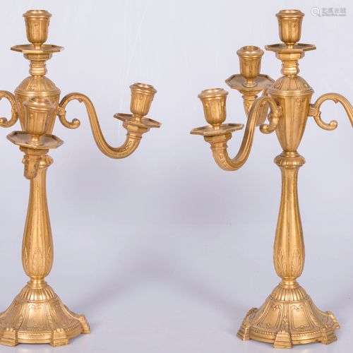 A set of (2) three ligth gilt candlesticks, Charles X-style,...