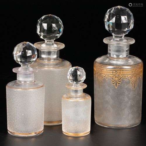 A lot comprised of (4) crystal carafes, France, early 20th c...