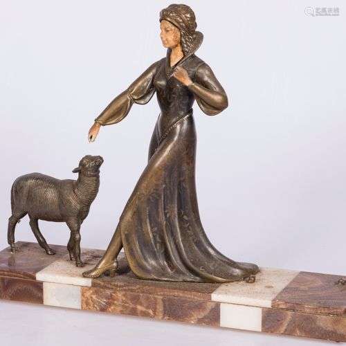 A ZAMAC sculpture of a lady with a sheep, Italy, 2nd quarter...