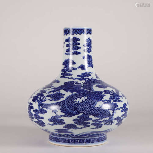 A Blue And White Dragon Bottle Vase