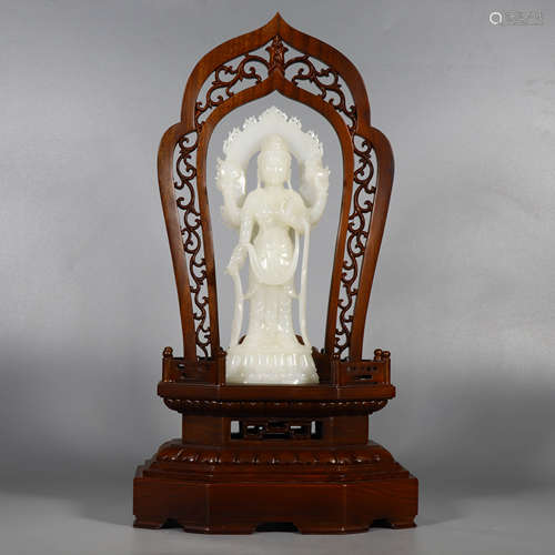 A Carved Hetian White Jade Four-Armed Guanyin Statue