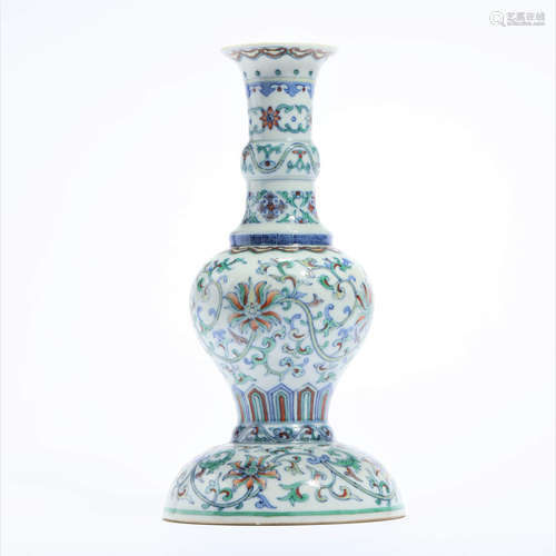 A Wucai Interlocking Lotus Candlestick