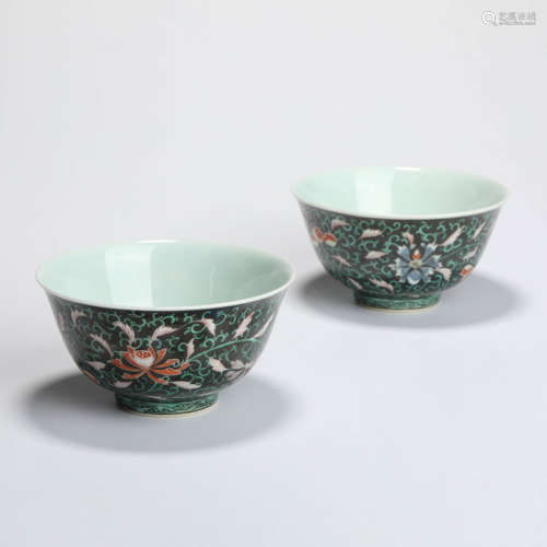 A Pair Of Black-Ground Famille Rose Interlocking Lotus Bowls