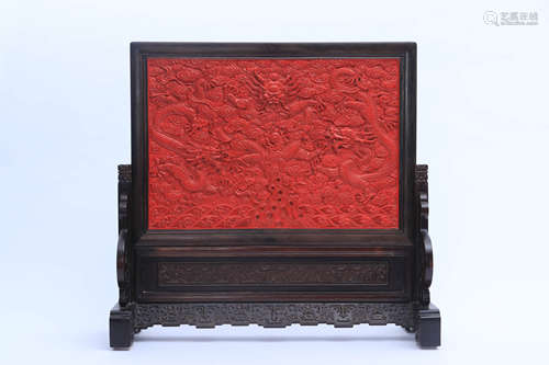 A Carved Cinnabar Lacquerware Dragon Table Screen