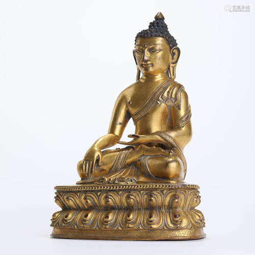 A Gilt Bronze Statue Of Shakyamuni