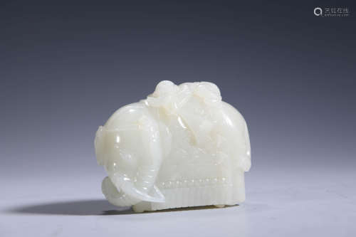 A Carved Hetian Jade Elephant And Boy Ornament