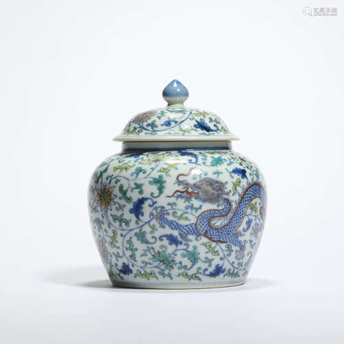 A Wucai Dragon Interlocking Lotus Jar And Cover