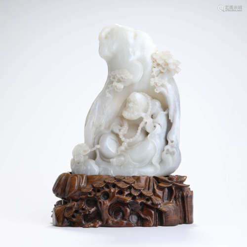 A Carved White Jade Arhat Boulder