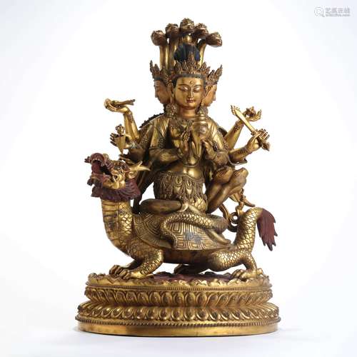 A Gilt Bronze Statue Of Three-Faced Guanyin