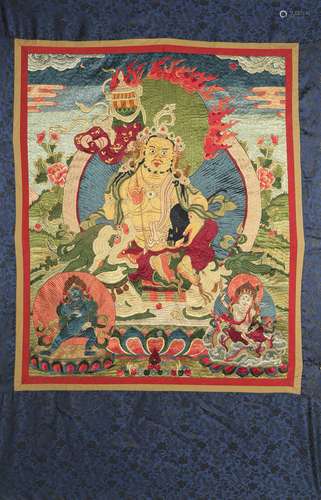 An Embroidered Thangka Of Jambhala