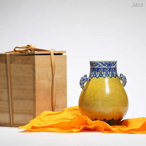 A Yellow Glaze And Underglaze-Blue Dragon Elephant-Eared Vas...