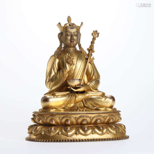 A Gilt Bronze Statue Of Padmasambhava