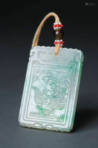 A Carved Jadeite Dragon And Phoenix Plaque Pendant