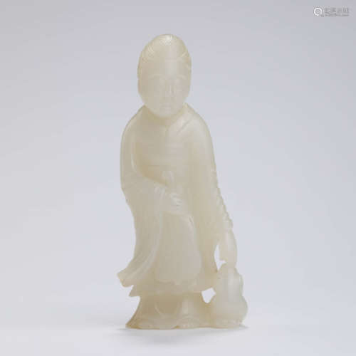 A Carved White Jade Female Attendant