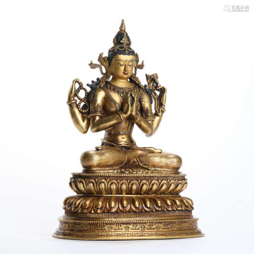 A Gilt Bronze Statue Of Four-Armed Guanyin