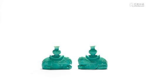 A Pair Of Green Enameled Elephant Ornaments