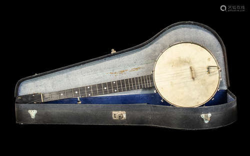 Vintage Four String Banjo in black carrying case.