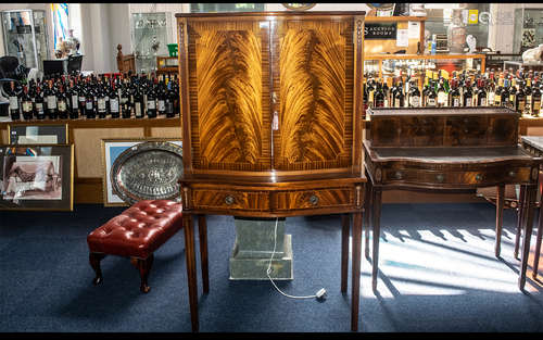 A Mid Century Mahogany Cocktail Cabinet, mirrored interior w...