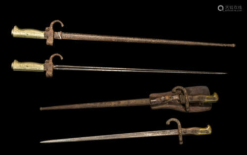 Two Antique French Bayonets in original scabbards comprising...