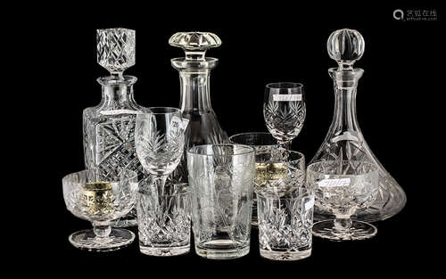 Three Various Cut Glass Decanters with stoppers, cut glass s...