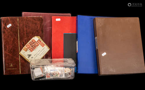 A Collection of Assorted Stamp Albums. One has several mint ...