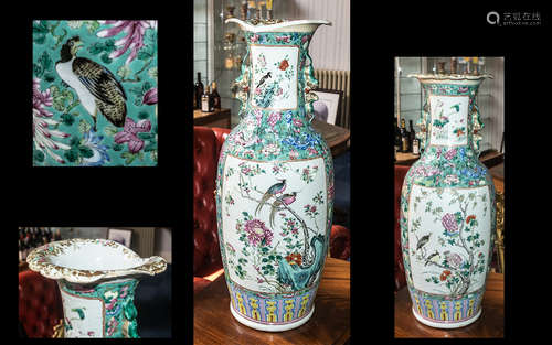 A Chinese 19th Century Cantonese Vase decorated in Famille R...