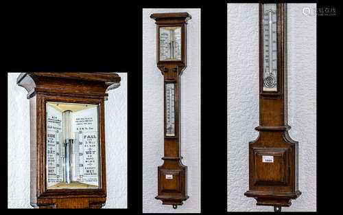 A Late Victorian Oak Stick Barometer makers Adie, Broadway W...