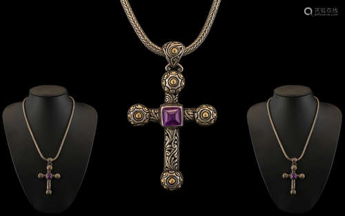 Large Silver and Gold Cross Set With an Amethyst Stone to th...