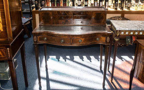 A Mid 20th Century Ladies Writing Desk, with a grey leather ...