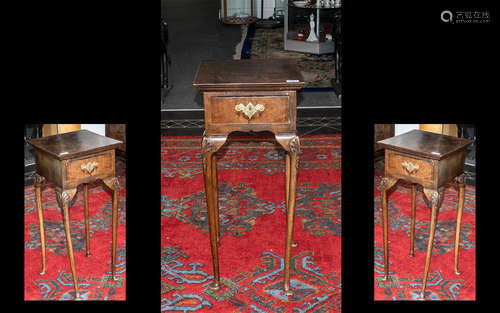 A Queen Anne Style Small Walnut Telephone Table with a centr...