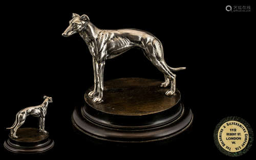 Model of Greyhound raised on wooden plinth, made by the Gold...