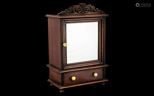 Small Mahogany Cabinet with mirrored door and drawer beneath...