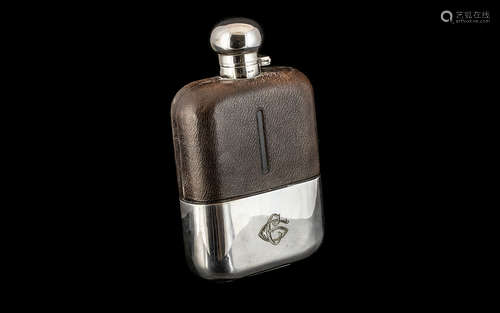 A Jumbo Size Gentleman's Silver Plated Hip Flask, with a lea...