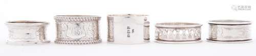 Five silver napkin rings, various makers and dates, two pair...