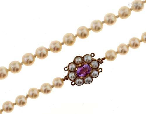 A cultured pearl necklace, composed of a single row of 6mm c...