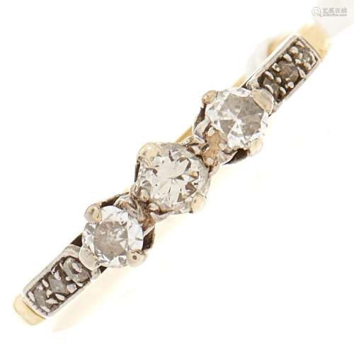 A three stone diamond ring, in gold, 2.5g, size O½