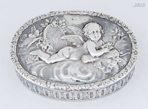 A German silver trinket box, the lid die stamped with putto ...