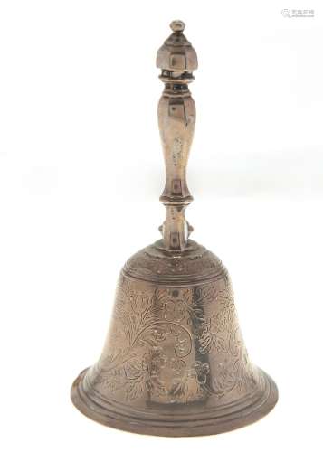A Victorian silver table bell, engraved with flowers and fol...