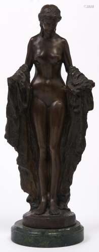 A bronze patinated brass sculpture of a woman, after Rubin, ...