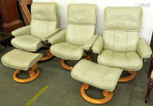 A set of three Stressless cream leather armchairs and a pair...
