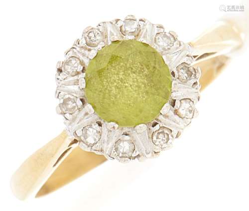 An 18ct gold diamond and peridot ring, 3.9g, size N½