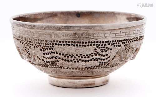 A South East Asian cast and pierced silver dragons bowl, 20t...