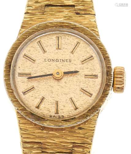 A Longines gold plated lady's wristwatch, with textured tape...