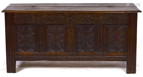 An 18th c carved and panelled oak blanket chest, 73cm h; 155...