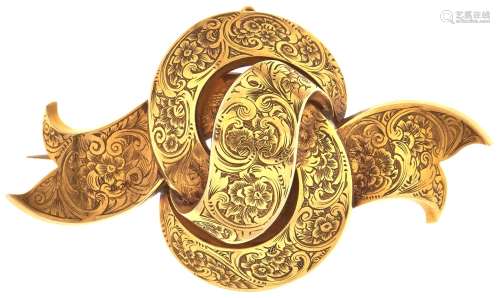 A Victorian gold knot brooch, c1870, with locket back and ho...