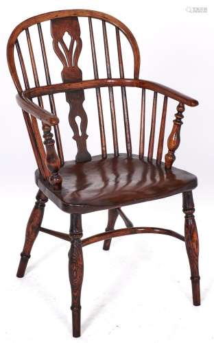 A Victorian ash low back Windsor chair, East Midlands region...